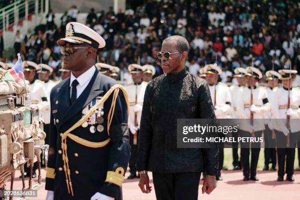 Mangaliso Geingob, son of the late Namibian President Hage Geingob escort the coffin of his father at the Independence Stadium in Windhoek, Namibia,...