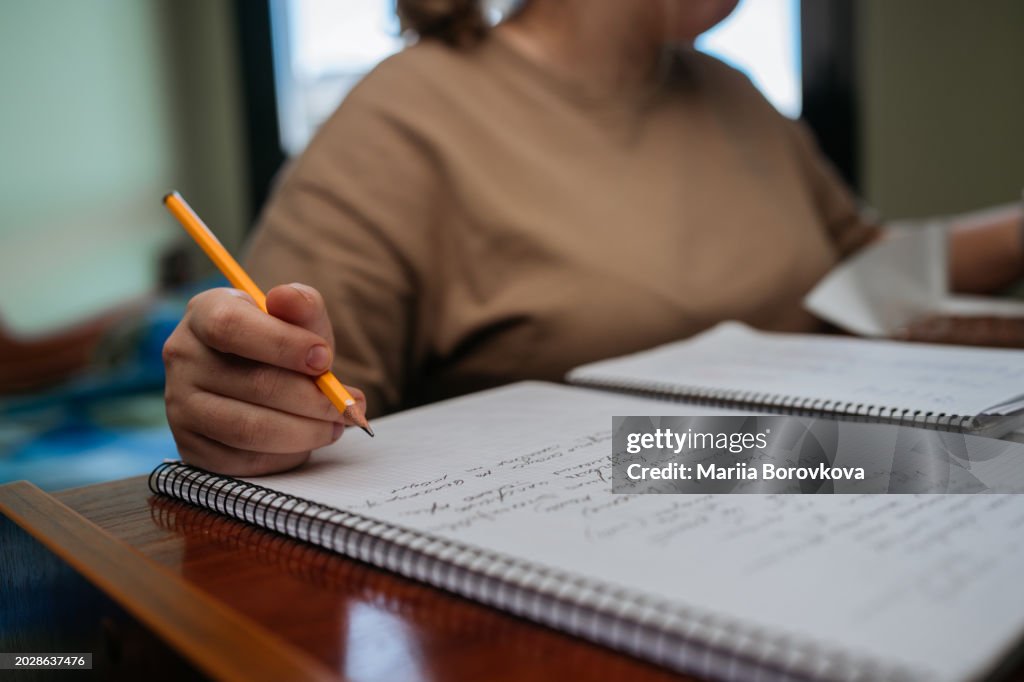 Young Woman Studying in Her Dorm Room