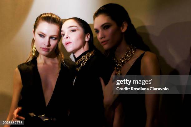 Felice Nova Noordhoff, Mariacarla Boscono and Grace Valentine pose backstage ahead of the Roberto Cavalli fashion show during the Milan Fashion Week...