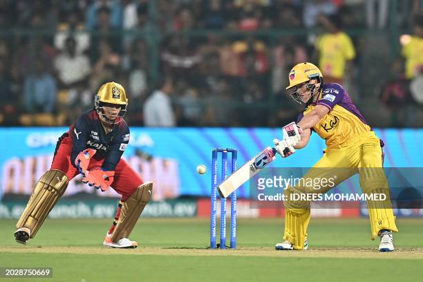 Warriorz's Grace Harris plays a shot in front of Royal Challengers Bangalore's wicket keeper Richa Ghosh during the Women's Premier League Twenty20...