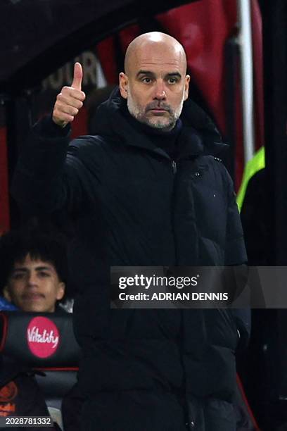 Manchester City's Spanish manager Pep Guardiola gestures on the touchline during the English Premier League football match between Bournemouth and...