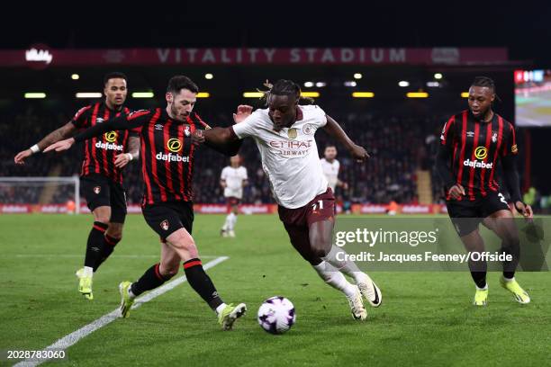 Jeremy Doku of Manchester City and Adam Smith of Bournemouth during the Premier League match between AFC Bournemouth and Manchester City at Vitality...