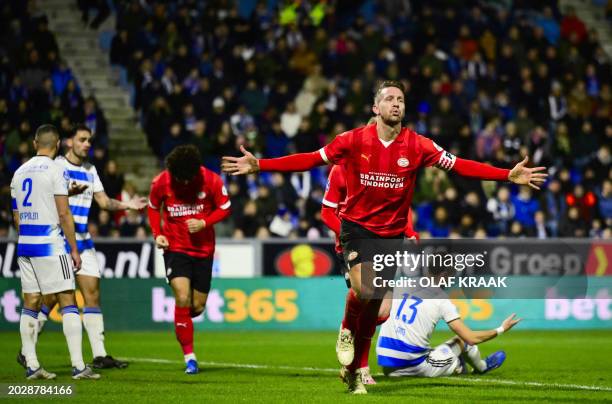 Luuk de PSV's Dutch forward Luuk de Jong celebrates the teams second goal during the Dutch Eredivisie football match between PEC Zwolle and PSV...