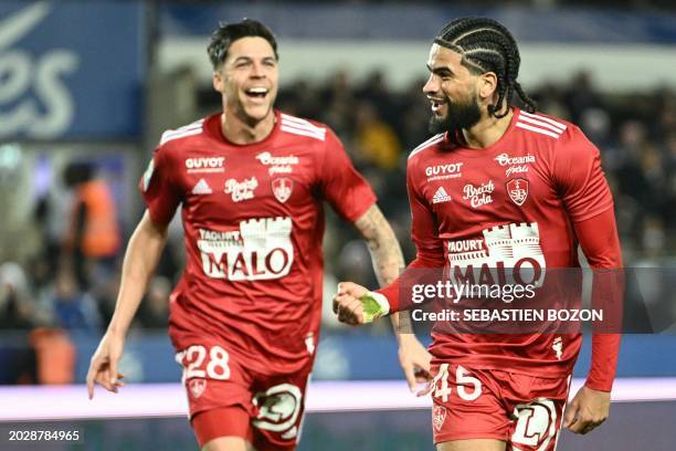 Brest's French Gambian midfielder Mahdi Camara celebrates scoring his team's first goal with Brest's French midfielder Jonas Martin during the French...