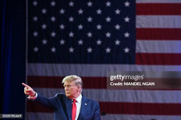 Former US President and 2024 presidential hopeful Donald Trump departs after speaking at the annual Conservative Political Action Conference meeting...