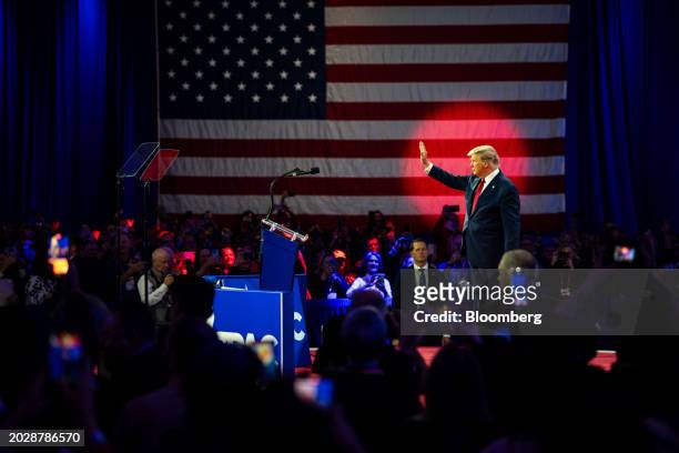 Former US President Donald Trump waves after speaking during the Conservative Political Action Conference in National Harbor, Maryland, US, on...