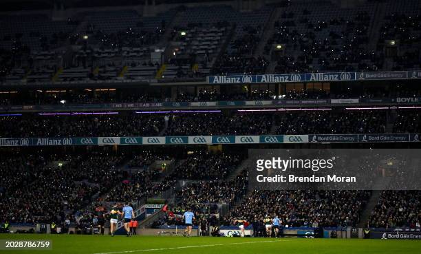 Dublin , Ireland - 24 February 2024; Supporters use the torch on their phones to shine a light for hope during 'Light Up Croke Park for Peace in...