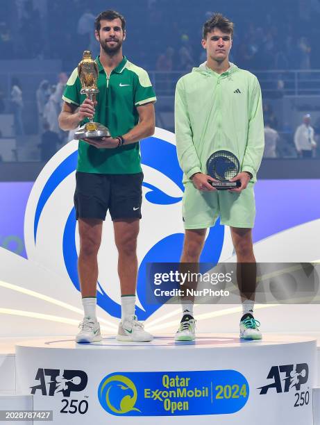 Karen Khachanov , the winner, and Jakub Mensik of the Czech Republic, the runner-up, are participating in the ceremony of the men's singles final...