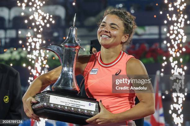 Jasmine Paolini of Italy poses with her winner trophy after victory against Anna Kalinskaya of Russia in their Women's Singles Final match during the...