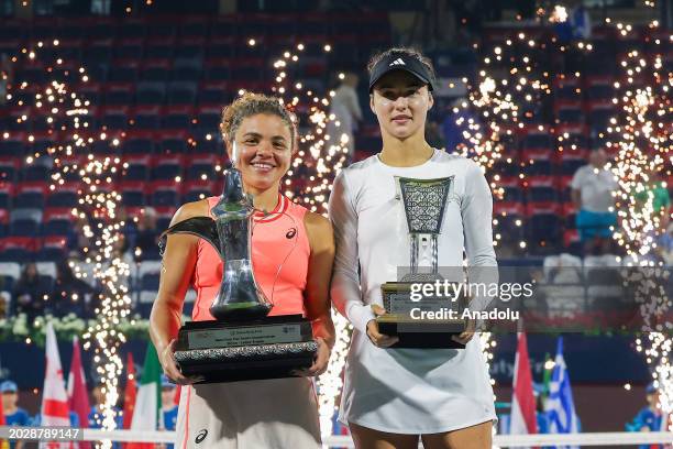 Jasmine Paolini of Italy and Anna Kalinskaya of Russia hold their winners trophies after their Women's Singles Final match during the Dubai Duty Free...