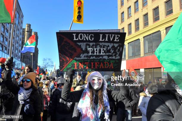 Demonstrators carrying Palestinian flags and banners protest against Israel's attacks on Gaza and Rafah in Ottawa, Canada on February 24, 2024.