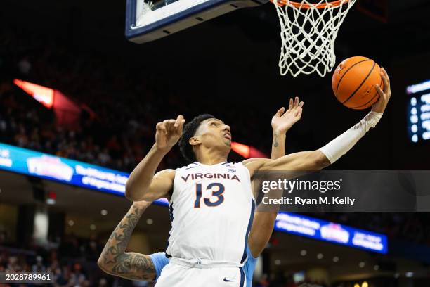 Ryan Dunn of the Virginia Cavaliers shoots past Armando Bacot of the North Carolina Tar Heels in the second half during a game at John Paul Jones...