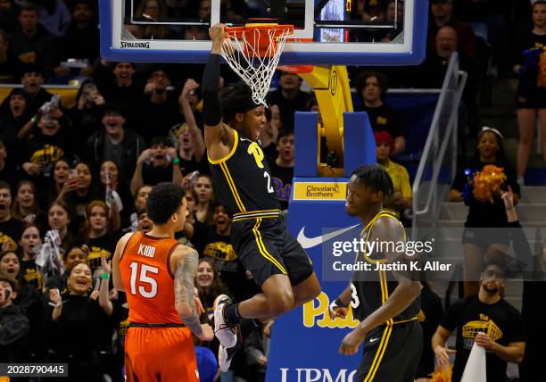 Blake Hinson of the Pittsburgh Panthers dunks against the Virginia Tech Hokies in the first half at Petersen Events Center on February 24, 2024 in...