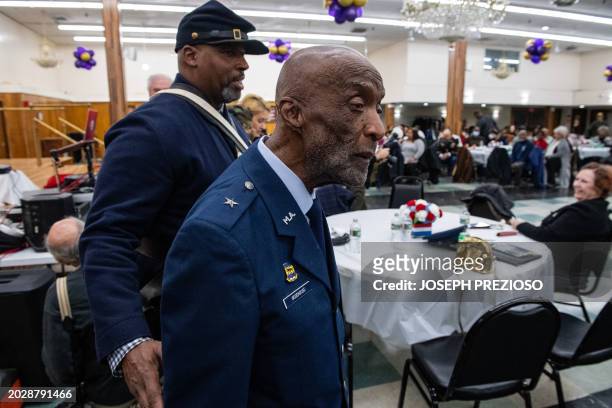 Brigadier General Enoch "Woody" Woodhouse one of the last surviving Tuskegee Airman, makes his way back to his table during the City's Black Veterans...