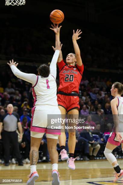 Ball State Cardinals forward Alex Richard shoots over Toledo Rockets guard Nan Garcia during the third quarter of a regular season Mid-American...