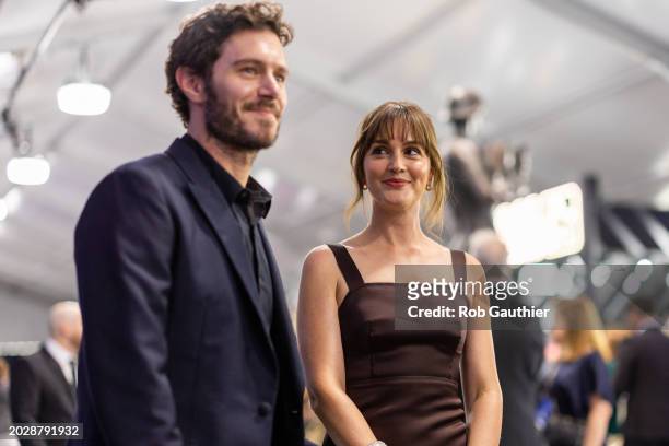 Los Angeles, CA Adam Brody and Leighton Meester arriving on the red carpet at the 30th Screen Actors Guild Awards in Shrine Auditorium and Expo Hall...