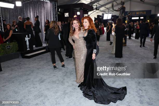 Los Angeles, CA Joely Fisher and Lisa Ann Walter arriving on the red carpet at the 30th Screen Actors Guild Awards in Shrine Auditorium and Expo Hall...