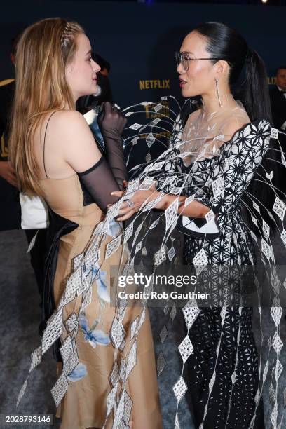 Los Angeles, CA Joey King and Ali Wong arriving on the red carpet at the 30th Screen Actors Guild Awards in Shrine Auditorium and Expo Hall in Los...