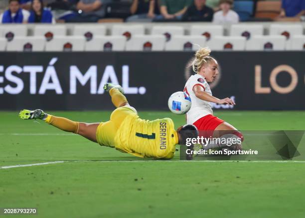 El Salvador goalkeeper Idalia Serrano slides to trap a shot made by Canada forward Adriana Leon in the first half the CONCACAF Womens Gold Cup Group...