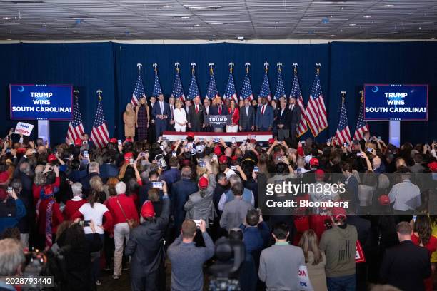 Former US President Donald Trump, center, speaks during an election night watch party at the South Carolina State Fairgrounds in Columbia, South...