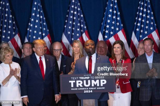 Senator Tim Scott, a Republican from South Carolina, center, speaks during an election night watch party with former US President Donald Trump,...
