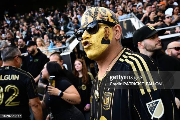 Los Angeles FC fans cheer during the MLS football match between the Los Angeles FC and Seattle Sounders at BMO Stadium in Los Angeles, California on...