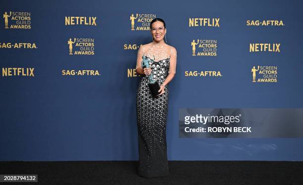 Actress Ali Wong poses in the press room with the award for Outstanding Performance by a Female Actor in a Television Movie or Limited Series for...