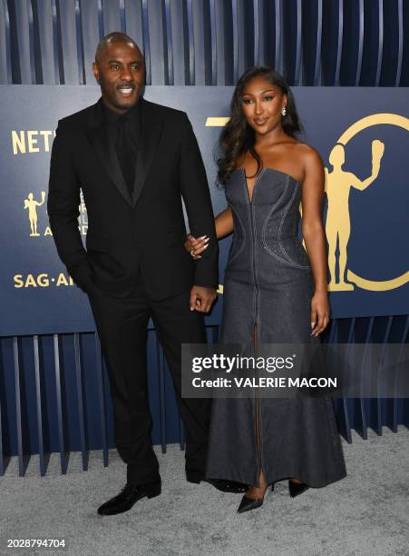 English actor Idris Elba and Isan ELba arrive for the 30th Annual Screen Actors Guild awards at the Shrine Auditorium in Los Angeles, February 24,...