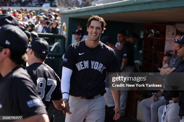 Spencer Jones of the New York Yankees smiles during a spring training game against the Detroit Tigers at Publix Field at Joker Marchant Stadium on...