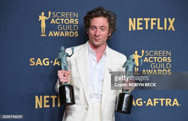 Actor Jeremy Allen White poses in the press room with the awards for Outstanding Performance by a Male Actor in a Comedy Series and Outstanding...