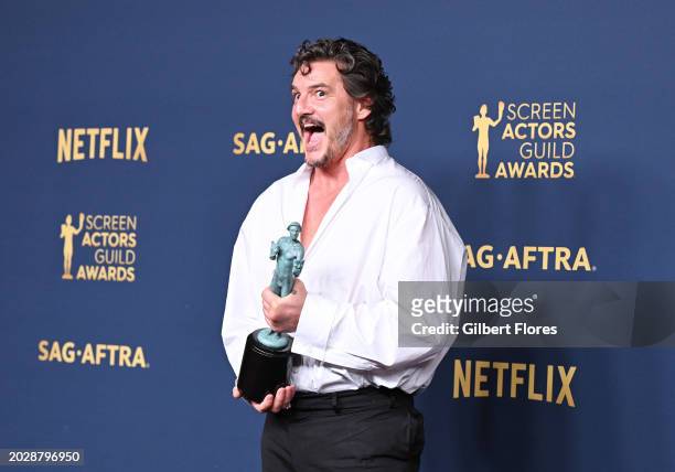 Pedro Pascal poses in the press room with the award for Outstanding Performance by a Male Actor in a Drama Series for "The Last of Us" during at the...