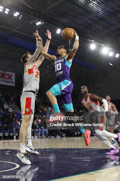 Amari Bailey of the Greensboro Swarm drives to the basket during the game against College Park Skyhawks on February 24, 2024 at Greensboro Coliseum...