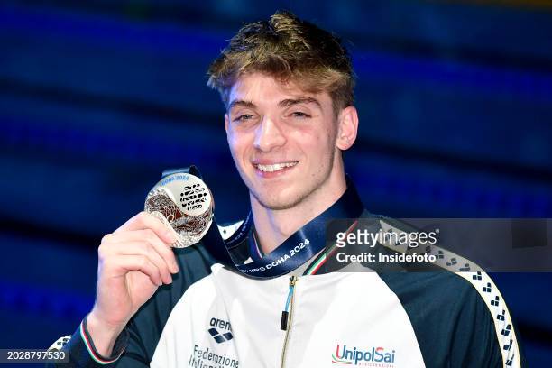 Alessandro Miressi of Italy shows the medal after competing in the swimming 100m Freestyle Men Final during the 21st World Aquatics Championships....