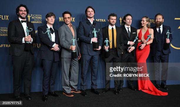 Benny Safdie, Cillian Murphy, Robert Downey Jr., Josh Hartnett, Alden Ehrenreich, Casey Affleck, Emily Blunt and Kenneth Branagh, winner of the...