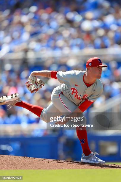 Philadelphia Phillies pitcher Kolby Allard delivers a pitch to the plate during the spring training game between the Philadelphia Phillies and the...