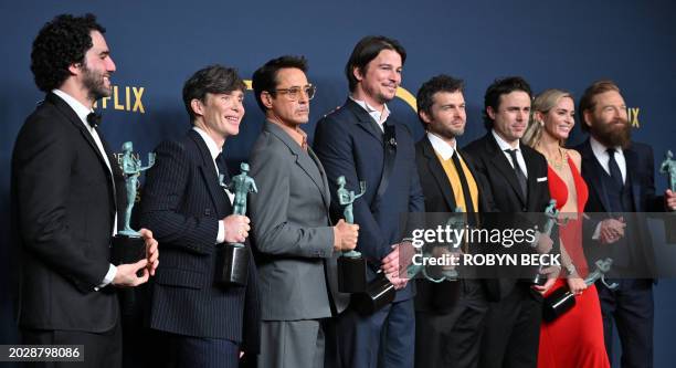 Benny Safdie, Cillian Murphy, Robert Downey Jr., Josh Hartnett, Alden Ehrenreich, Casey Affleck, Emily Blunt and Kenneth Branagh, winner of the...