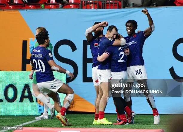 Jubilant team France after Antoine Dupont scores a try against Ireland to win the game during HSBC SVNS Vancouver tournament in Vancouver, BC,...