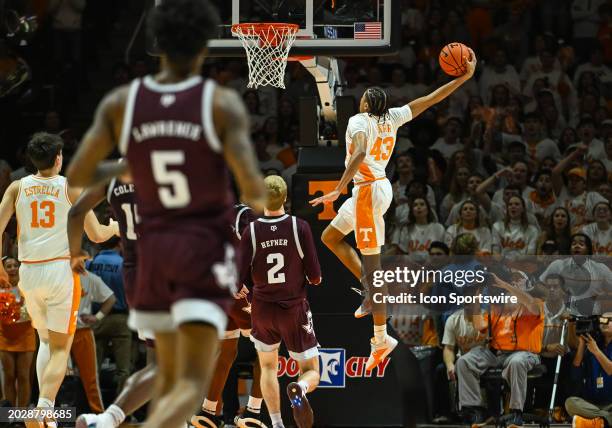 Tennessee Volunteers guard Cameron Carr dunks the ball during the college basketball game between the Tennessee Volunteers and the Texas A&M Aggies...