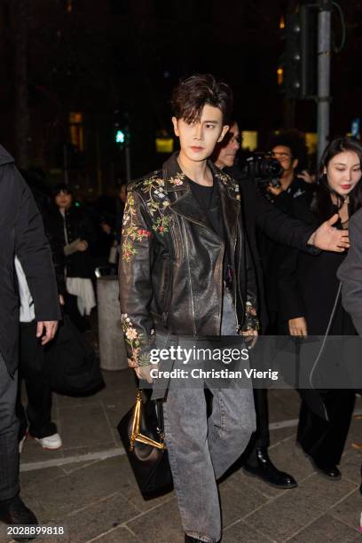 Ren Jialun aka Allen Ren wears black leather jacket, denim jeans, bag outside Etro during the Milan Fashion Week - Womenswear Fall/Winter 2024-2025...