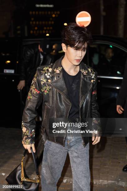 Ren Jialun aka Allen Ren wears black leather jacket, denim jeans, bag outside Etro during the Milan Fashion Week - Womenswear Fall/Winter 2024-2025...