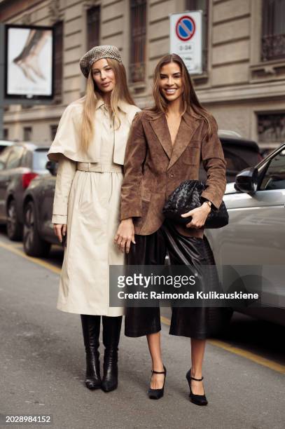 Mathilde Gøhler wears a beret, grey trench coat, and black long boots and Philine Roepstorff wears black leather cropped wide pants, brown blazer,...