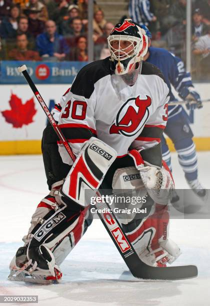 Martin Brodeur of the Carolina Hurricanes skates against the Toronto Maple Leafs during NHL game action on February 28, 2004 at Air Canada Centre in...