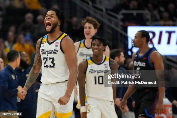 David Joplin of the Marquette Golden Eagles celebrates at the end of the first half against the DePaul Blue Demons at Fiserv Forum on February 21,...