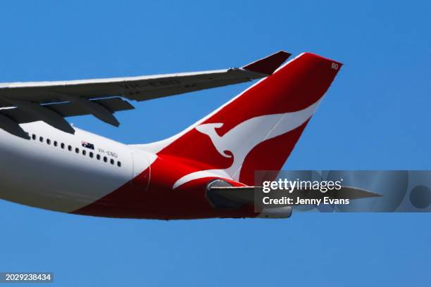 The tail of a Qantas plane is seen at take off from Sydney International Airport on February 22, 2024 in Sydney, Australia. Qantas has demonstrated a...