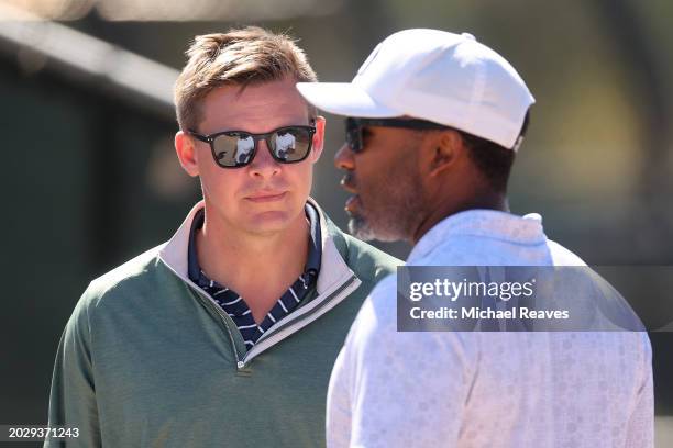 Senior vice president and general manager Chris Getz of the Chicago White Sox talks with assistant general manager Josh Barfield during a spring...