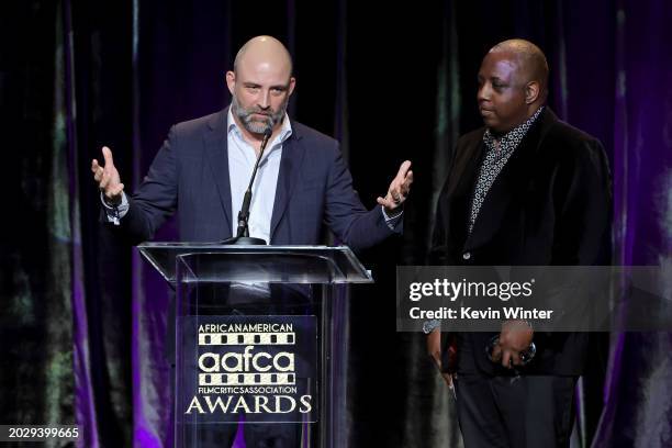 Joaquim Dos Santos and Kemp Powers accept the Best Animated Feature Award for "Spider-Man: Across the Spider-Verse" onstage during the 15th Annual...