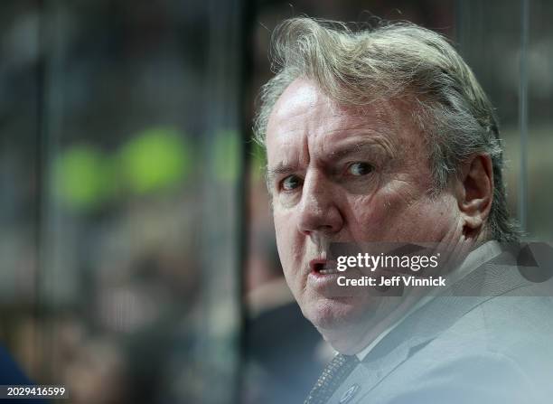 Head coach Rick Bowness of the Winnipeg Jets looks on from the bench during their NHL game against the Vancouver Canucks at Rogers Arena on February...