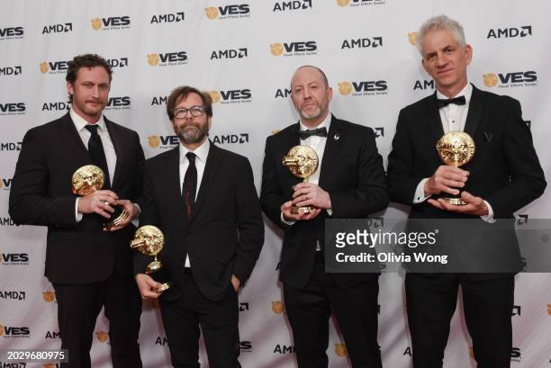 Alan Hawkins, Christian Hejnal, Michael Lasker and Matt Hausman win the VES Award for Outstanding Visual Effects in an Animated Feature for...