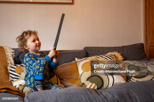 child playing at home - toy sword stock pictures, royalty-free photos & images