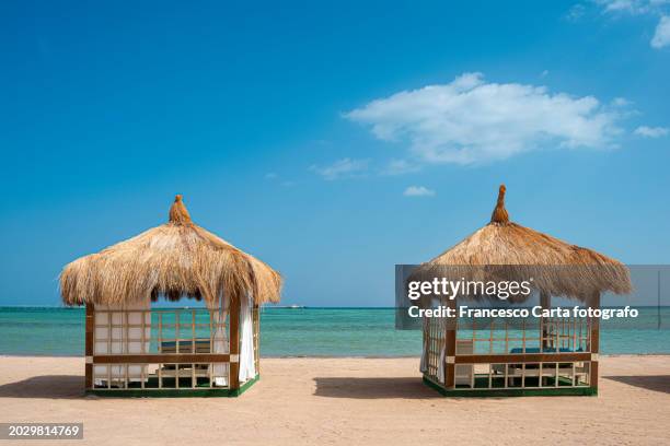gazebo on a resort beach in sharm el sheikh - beach cabana stock pictures, royalty-free photos & images